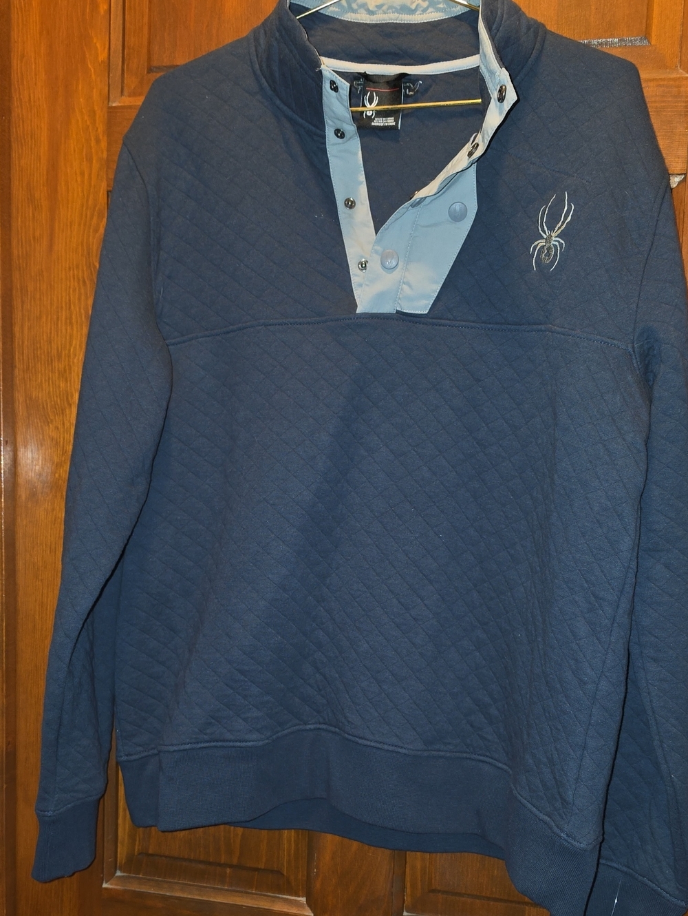 Spyder Quilted Pullover in Navy with Light Blue Placket